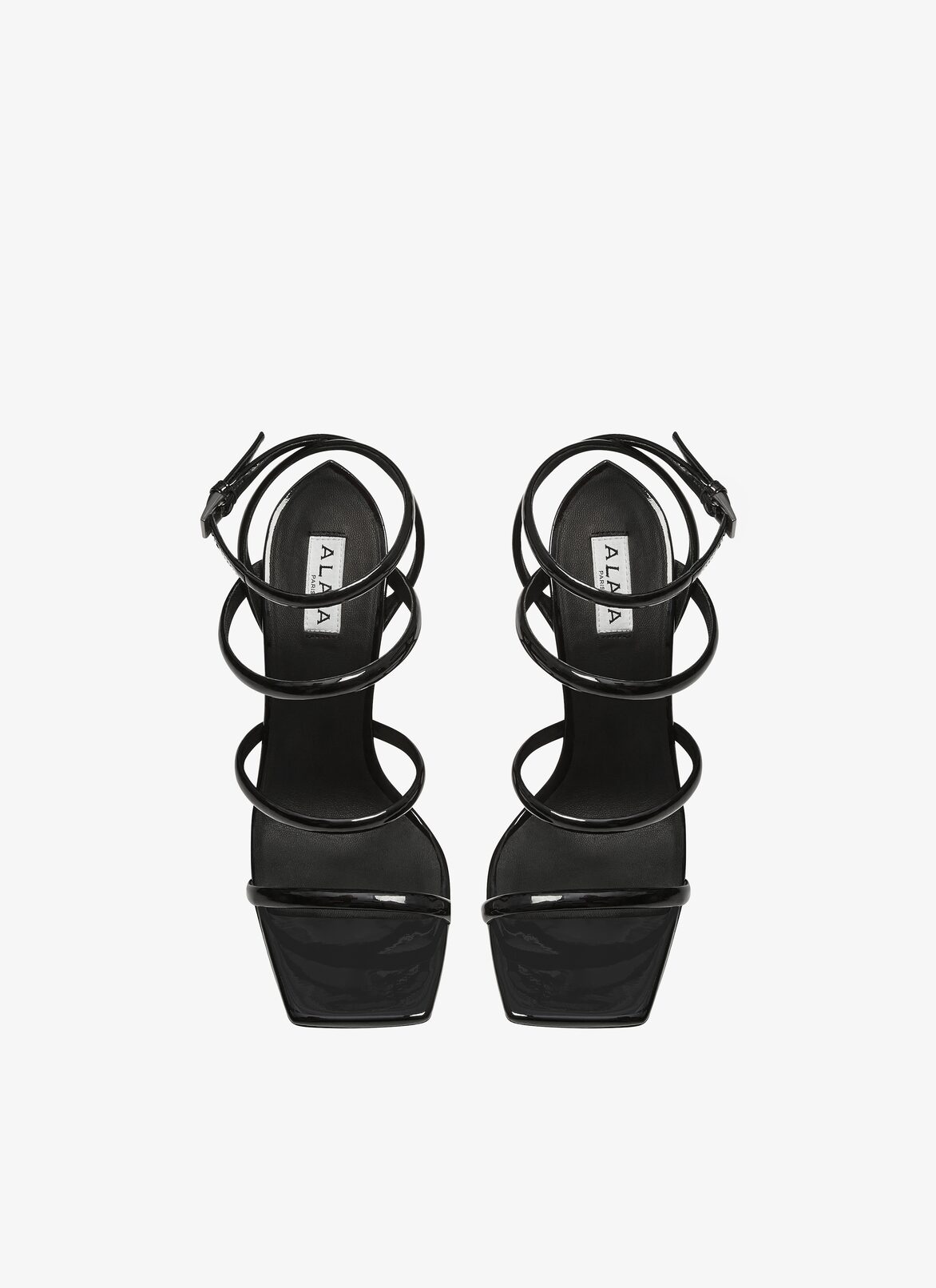 Perforated sandals in patent calfskin ALAÏA BLACK PERFORATED SANDALS IN PATENT CALFSKIN